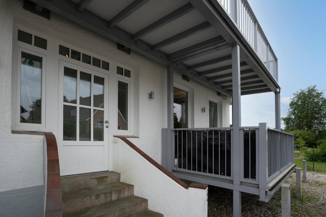 Apartamento Haus Waldfrieden Ferienhaeuschen Waldfrieden Haffkrug Exterior foto