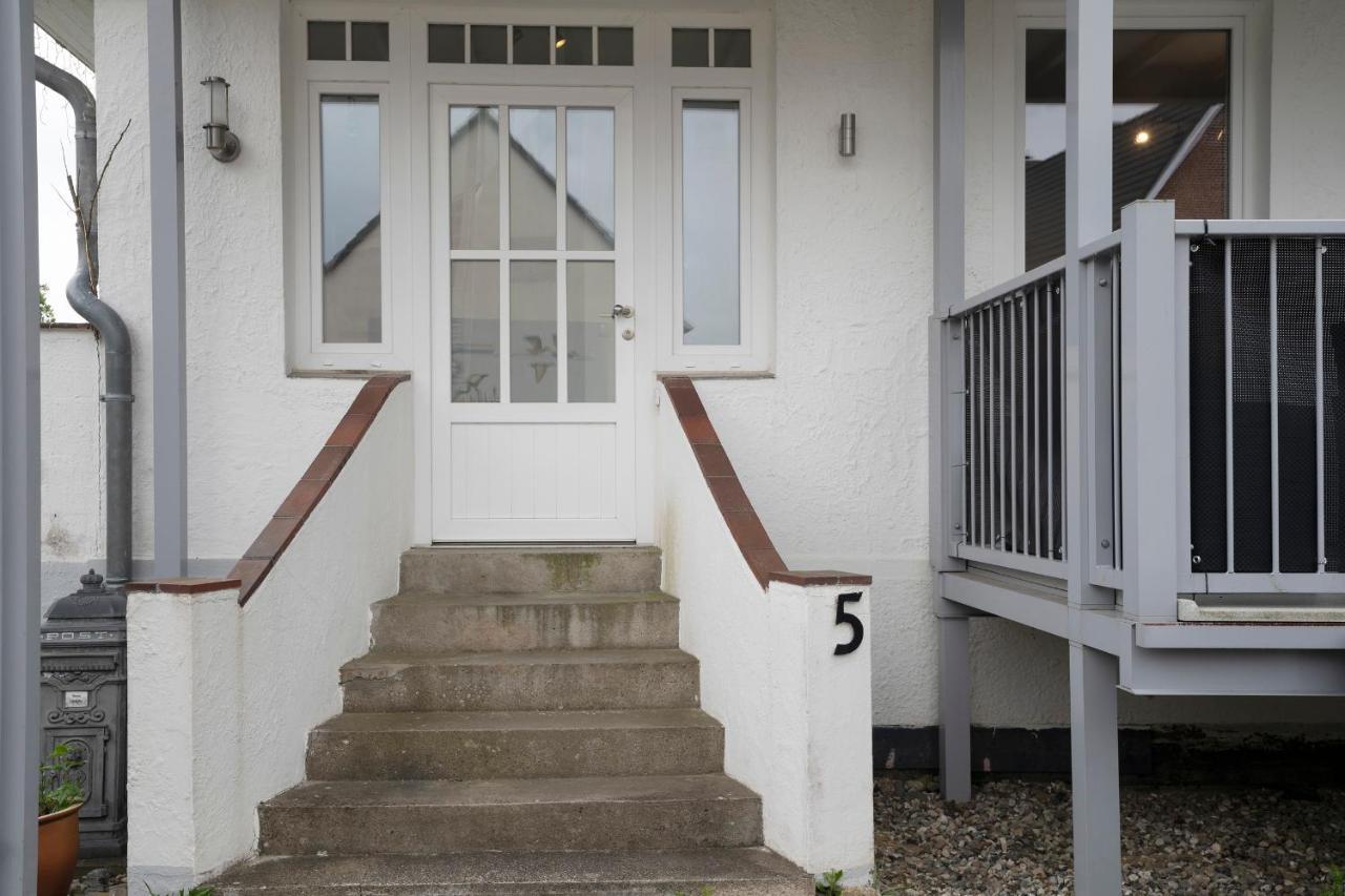 Apartamento Haus Waldfrieden Ferienhaeuschen Waldfrieden Haffkrug Exterior foto
