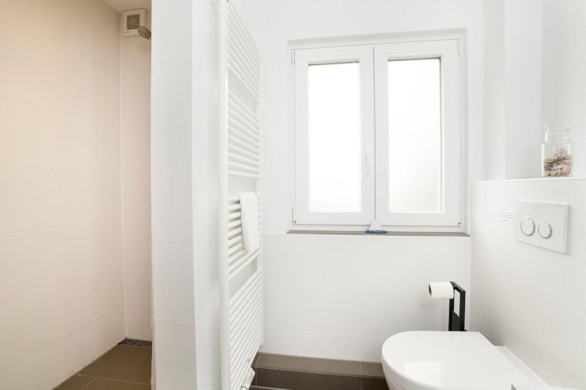 Apartamento Haus Waldfrieden Ferienhaeuschen Waldfrieden Haffkrug Exterior foto