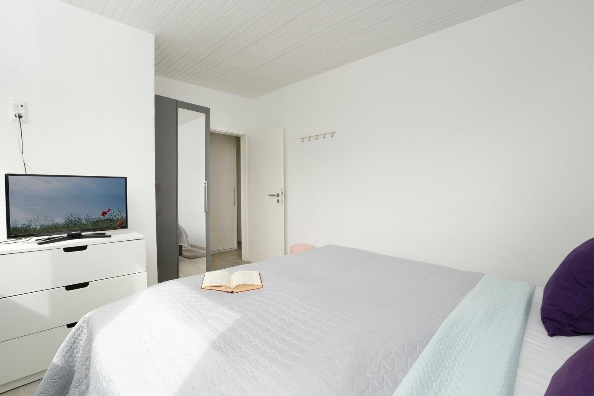 Apartamento Haus Waldfrieden Ferienhaeuschen Waldfrieden Haffkrug Exterior foto
